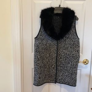 Talbots vest 80% polyester 20% wool.